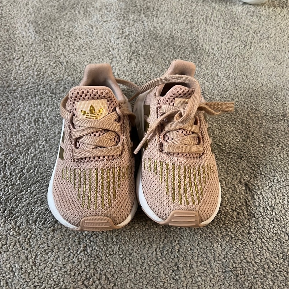 Size 5T Adidas shoes. Perfect for new walkers!